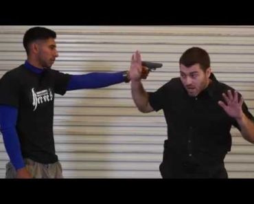 Self Defense Tactics: Gun To Head Disarm