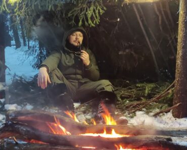 Solo camping in snow, bushcraft shelter, winter ambience, overnight, no tent. ASMR.