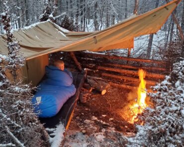 Winter Camping in Snow Storm with Survival Shelter & Bushcraft Cot.